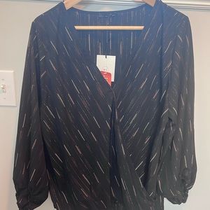 Black blouse with gold and white accents